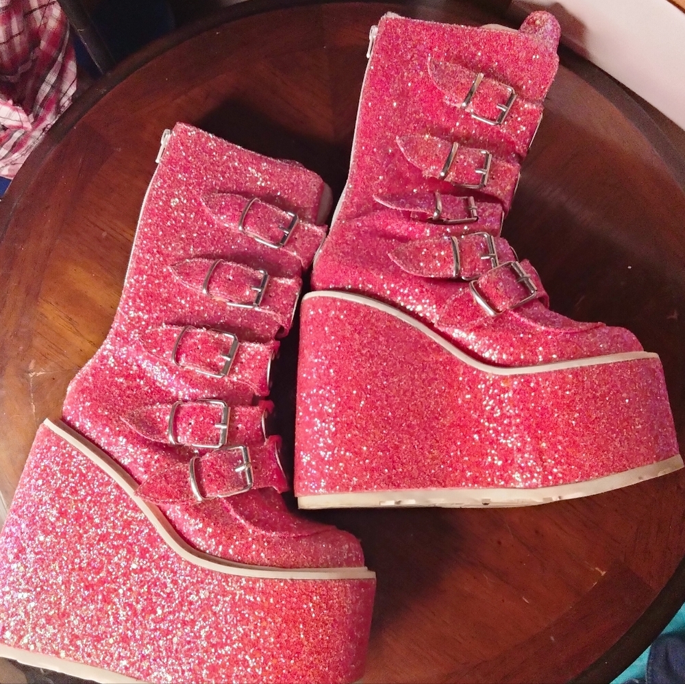 - Lady size 6.5 pink platform boots by demonia.. very lightly used EUC
